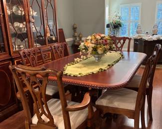 Dining Table w 8 chairs ( 2 captain's chairs ) and 1 leaf $2, 475.00