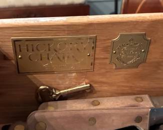 inside plaque of the china cabinet