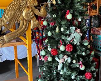 Fully decorated Christmas tree on casters