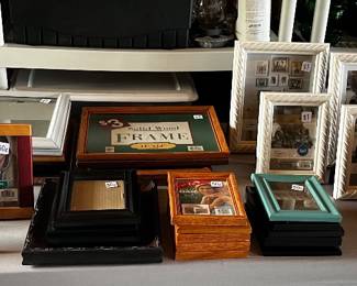 Lots of picture frames, several brand new