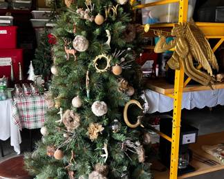 Fully decorated Christmas tree on casters