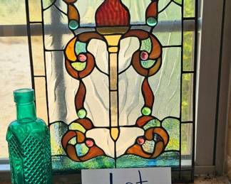 Lot 97 Large stained glass bottle