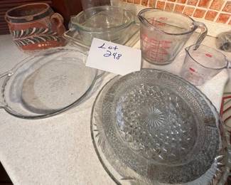 Lot 248 Measuring cups more