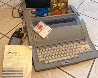 Lot 199 Vintage Brother typewriter, more