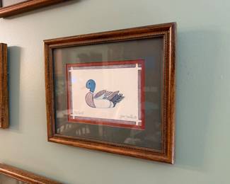 framed and matted folk-art style print of a canvasback duck, signed by artist Jean Smith