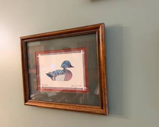framed and matted folk-art style print of a canvasback duck, signed by artist Jean Smith