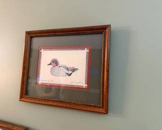 framed and matted folk-art style print of a canvasback duck, signed by artist Jean Smith