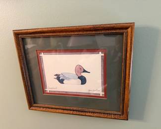 framed and matted folk-art style print of a canvasback duck, signed by artist Jean Smith