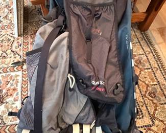 large, blue and gray internal-frame hiking backpack