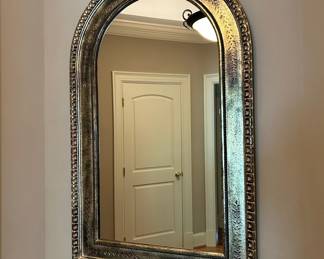 Arched Wall Mirror with Embossed Silver-Toned Frame
