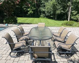 Oval Patio Dining Set with Swivel Rocker Chairs