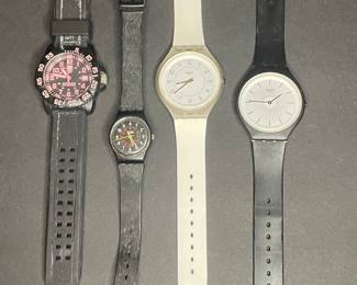 Collection of Swatch and Luminox Watches
