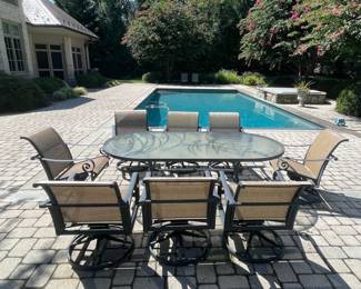 Oval Patio Dining Set with Swivel Rocker Chairs