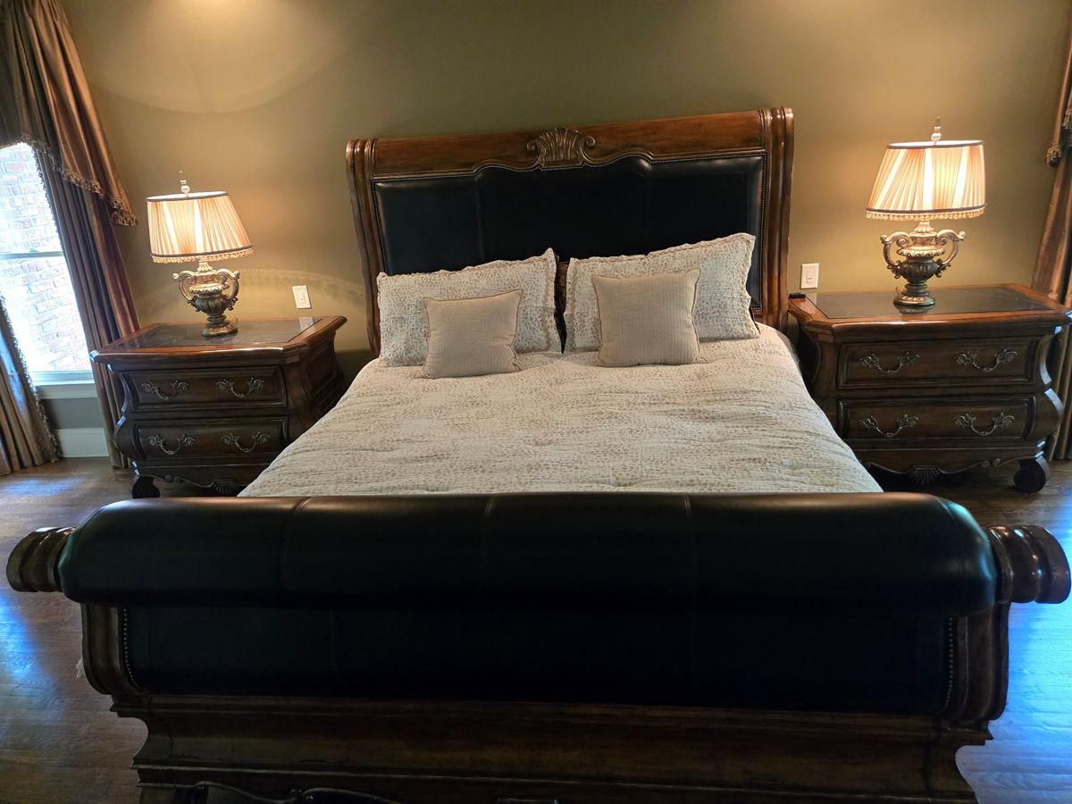 King leather sleigh bed with matching nightstands, set