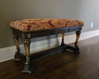 Ornate carved bench, damask upholstery, gold accent legs