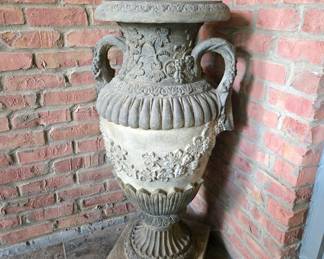 Large cast concrete garden urn on pedestal, ornate design