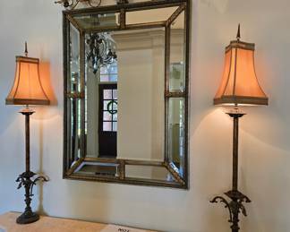 Ornate gilt wall mirror with matching wrought iron lamps pair