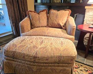 Paisley upholstered oversized chair with matching ottoman