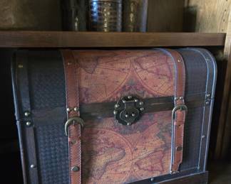 Decorative map-print treasure chest trunk with leather straps