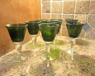 Set of 8 green glass wine goblets, clear stems