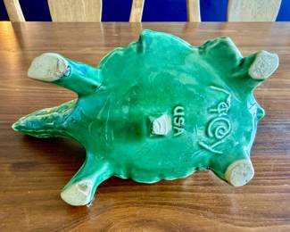 vintage 1940s Nelson McCoy USA Pottery Green Turtle Watering Can or Planter, featuring a glossy jade green glaze, an arched twig-like handle, and leaf-and-berry detailing