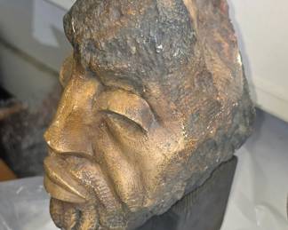 Leon Saulter carved stone head.