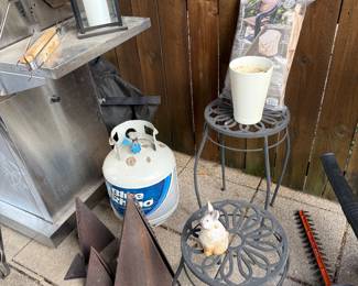 Propane tank, plant stands, chimes