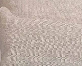 Fabric material & hue of colors.