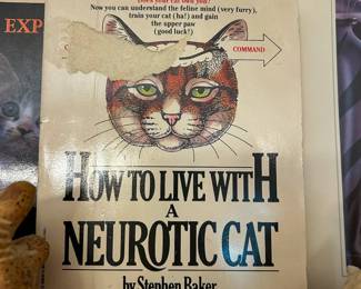 How to Live with a Neurotic Cat by Stephen Baker with an illustrated cat cover from the estate book collection