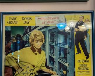 Framed That Touch of Mink movie display featuring Doris Day and Cary Grant with handwritten lettering visible