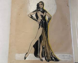 Costume drawing of a black and gold gown with a large circular headdress and handwritten production notes