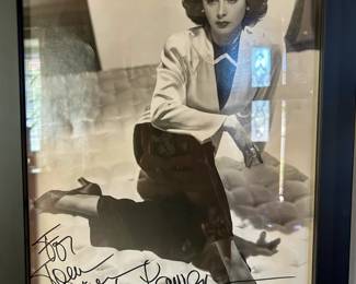 Black and white Hollywood portrait with a handwritten dedication to Tom and visible signature