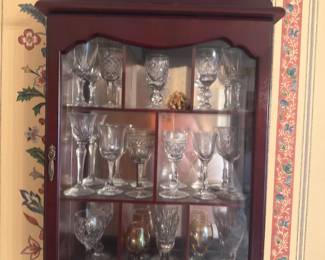 One of many wall-mounted curiou cabinets