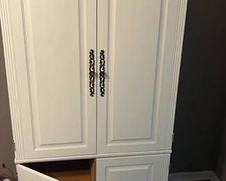 Adorable hutch. We used it as a closet substitute.