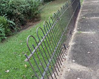 9- 4 foot sections of matching cast iron fencing painted black with the emblem of New Orleans fleurDi-Lis on top