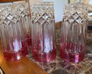 Set of red cut to clear dinner glasses 