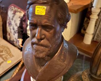Bronze bust of Robert E. Lee on white marble base