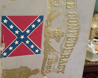 Period Civil war memorabilia is original book with gold letters and confederate flag on the front 