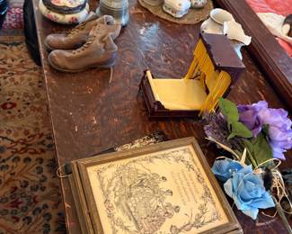 Several miscellaneous Victorian decorator items on a good Walnut Victorian center table which needs slight restoration on the top