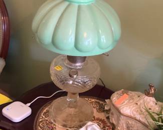 Victorian desk lamp with pale green shade, has been electrified but still has oil reservoir