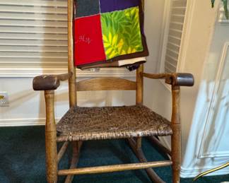 Antique Child's Ladder-Back Rocking Chair with Rush Seat
