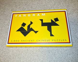 Tangram: 1,600 Ancient Chinese Puzzles by Joost Elffers & Michael Schuyt