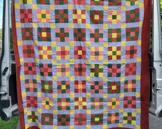 Wonderful colors in this cross and block quilt