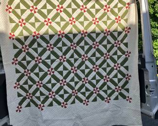 Pinwheels make this a striking quilt to hang.