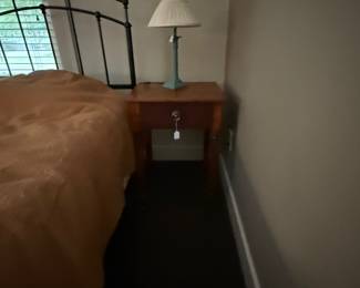 One drawer cherry stand. Bed is one of a twin in contemporary design.