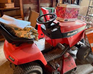 Simplicity LT125 model riding lawnmower. hydrostatic. HAS FRONT SNOW PLOW ATTACHMENT.  