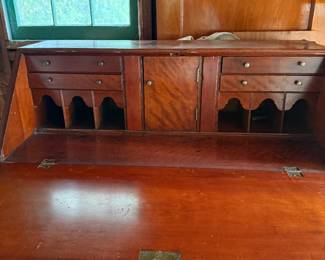 Interior of a restored Cherry drop front  desk. Next photo is exterior of same desk. 