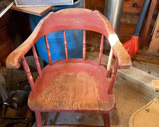 Captain’s chair in original red stain. 