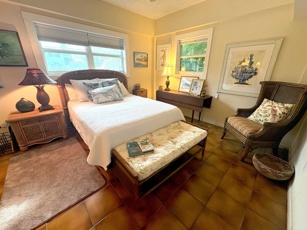 Brand new queen size mattress and frame -- check out the cane back barrel arm chair and the long drop leaf table!