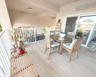 solid teak patio table (glass topped) and modern wood bench